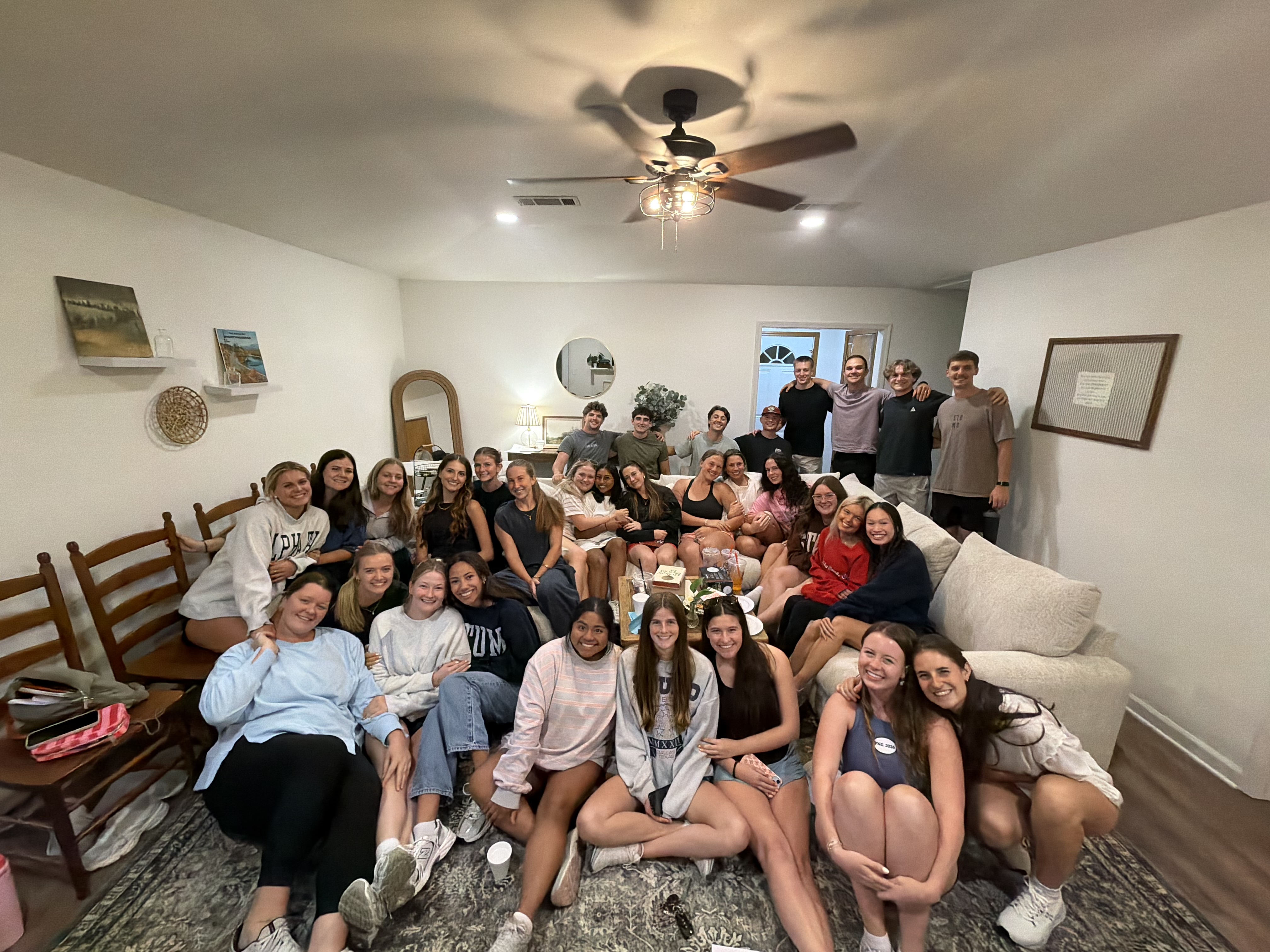 UCA students gathered in a home
